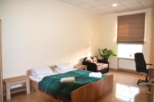 Postel nebo postele na pokoji v ubytování Coin Apartments & Poshtel