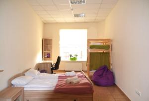 Postel nebo postele na pokoji v ubytování Coin Apartments & Poshtel