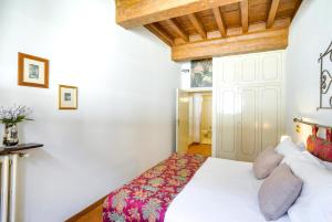 Postel nebo postele na pokoji v ubytování Palazzo Spinelli Apartment by Mamo Florence