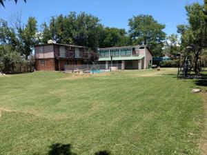 a large yard in front of a house at Ayres de Vistalba in Ciudad Lujan de Cuyo
