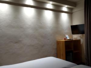 TV a/nebo společenská místnost v ubytování Beach Hotel Dos Mares