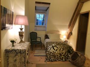 Postel nebo postele na pokoji v ubytování Chateau de Vauchelles