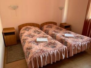 Postel nebo postele na pokoji v ubytování Inn on Zhytomyrska
