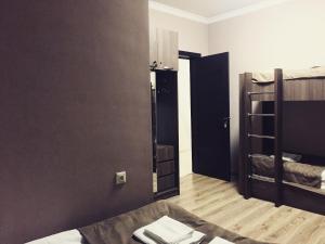 Postel nebo postele na pokoji v ubytování Tradition Hotel