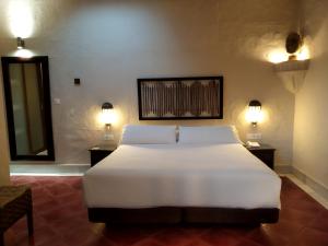 Postel nebo postele na pokoji v ubytování Beach Hotel Dos Mares