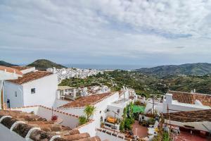 a view of a town from the roof of a building at Beach and Mountains in Frigiliana