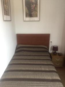 Łóżko lub łóżka w pokoju w obiekcie Ferienhaus für 5 bis 6 Personen