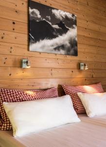 Postel nebo postele na pokoji v ubytování Lodge Seppaler