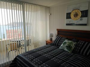 Postel nebo postele na pokoji v ubytování Departamento Vista Herradura + 41 fotografií