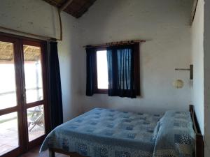 Postel nebo postele na pokoji v ubytování La Posada