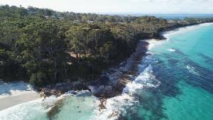 an aerial view of a beach and the ocean at Ocean View Villas in Vincentia