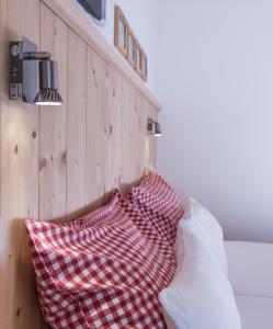 Postel nebo postele na pokoji v ubytování Lodge Seppaler