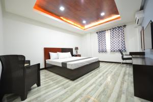 Postel nebo postele na pokoji v ubytování Hotel Gabriella