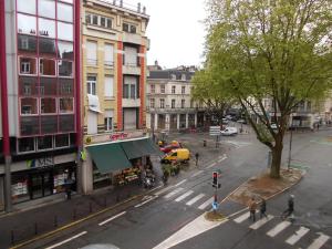 an overhead view of a city street with buildings at Nationale Appart Hotel in Lille