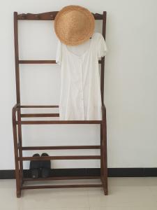 a hat sitting on top of a bunk bed at Green Hill Mirissa in Mirissa