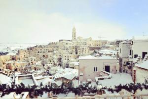 an aerial view of a city covered in snow at L'Affaccio in Matera