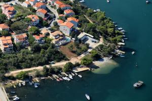an aerial view of an island with boats in the water at Apartments villa MaVeRo in Banjole
