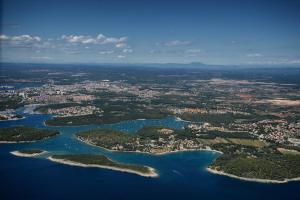 an aerial view of a group of islands and water at Apartments villa MaVeRo in Banjole