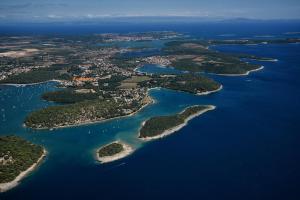 an aerial view of a group of islands in the water at Apartments villa MaVeRo in Banjole