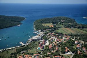 an aerial view of a small island in the water at Apartments villa MaVeRo in Banjole
