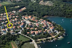 an aerial view of a house on a lake at Apartments villa MaVeRo in Banjole