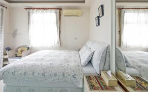 Voodi või voodid majutusasutuse Riverside B&B toas