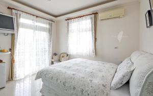 Voodi või voodid majutusasutuse Riverside B&B toas