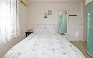 Voodi või voodid majutusasutuse Riverside B&B toas