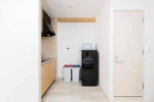 Kuchyň nebo kuchyňský kout v ubytování GuestHouse MIYABI