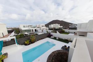 arial view of a villa with a swimming pool at Villa Alba Deluxe & Spa Pool in Playa Blanca