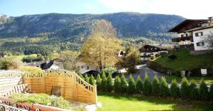 a view of a town with a mountain in the background at Müllers Ferienhaus Salzburgerland in Unken