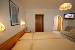 Letto o letti in una camera di Pension Riedlsperger