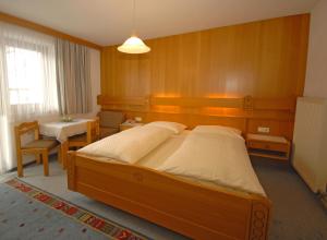 Letto o letti in una camera di Pension Riedlsperger