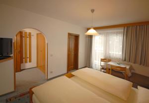 Letto o letti in una camera di Pension Riedlsperger