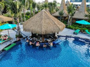 an overhead view of a swimming pool at a resort at Phi Phi CoCo Beach Resort in Phi Phi Islands