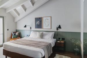 Voodi või voodid majutusasutuse Albergo Miramonti toas