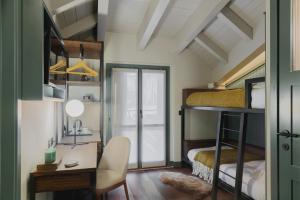 Voodi või voodid majutusasutuse Albergo Miramonti toas