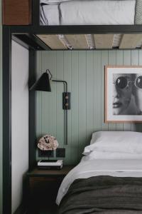 Voodi või voodid majutusasutuse Albergo Miramonti toas