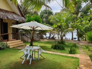 Zahrada ubytování Isla de Paz Beach Resort + 25 fotografií