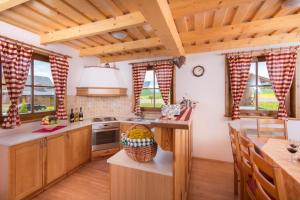 A kitchen or kitchenette at Víkendové Chalupy
