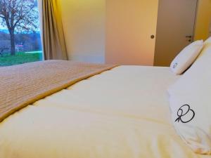 Postel nebo postele na pokoji v ubytování Quinta do Olival