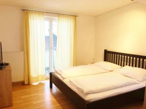Letto o letti in una camera di Hotel Garni Brigitte