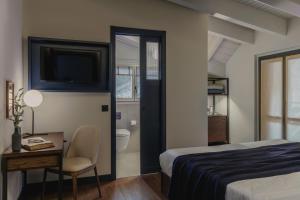 Voodi või voodid majutusasutuse Albergo Miramonti toas