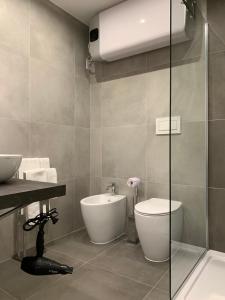 Ванная комната в ApartHotel Bossi