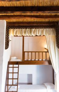 A bed or beds in a room at Akrotiri