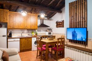 Kuchyň nebo kuchyňský kout v ubytování Casa Rural El Berrueco