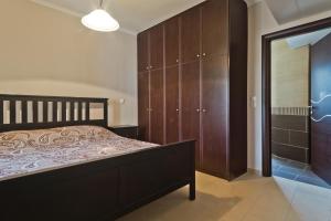 A bed or beds in a room at Lux Sea View Apartment
