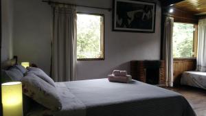 Cama o camas de una habitación en Meson Hotel