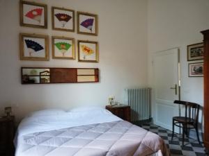 En eller flere senge i et værelse på la ginella la casa vintage