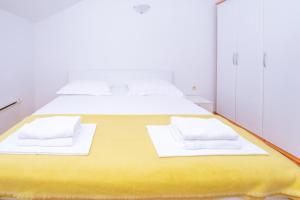 Postel nebo postele na pokoji v ubytování Mediterranean Blue Apartments